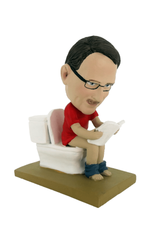 Custom made bobbleheads reading in the toilet