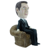 Figurine personnalisée dans une fauteuil